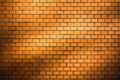 Brick wall background with natural shadow vignette. Orange brick wall background with natural shadow vignette royalty free illustration Brick wall background with natural shadow vignette. Orange brick wall background with natural shadow vignette royalty free illustration