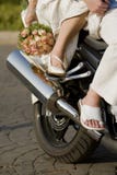 Bride And Groom On Motorbike Stock Photography