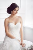 Bride in beautiful dress sitting on chair indoors royalty free stock photos Bride in beautiful dress sitting on chair indoors royalty free stock photos