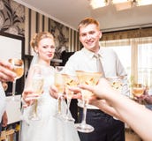 Bride and groom holding wedding champagne glasses Royalty Free Stock Photo Bride and groom holding wedding champagne glasses Royalty Free Stock Photo