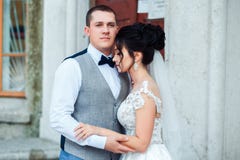 The bride and groom hug each other. stock photo The bride and groom hug each other. stock photo