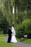 Bride and Groom in a park