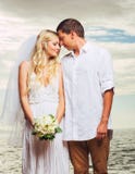 Bride and Groom, Romantic Newly Married Couple on the Beach, Just Married stock image Bride and Groom, Romantic Newly Married Couple on the Beach, Just Married stock image