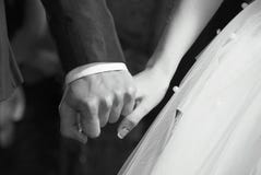 Bride hand in groom hand