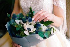 The bride is holding a stunning wedding bouquet. royalty free stock photos The bride is holding a stunning wedding bouquet. royalty free stock photos
