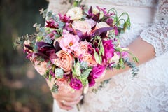 wedding bouquet in bride`s hands royalty free stock photography wedding bouquet in bride`s hands royalty free stock photography