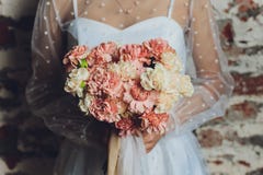 Bride Is Holding A Beautiful Wedding Bouquet. Royalty Free Stock Photo