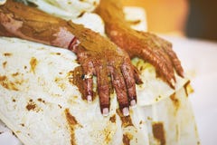 Bride`s hand with mehndi henna art with turmeric pasted during traditional rituals indian marriage stock images Bride`s hand with mehndi henna art with turmeric pasted during traditional rituals indian marriage stock images
