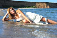 Bride of the sea - trash the wedding dress royalty free stock image Bride of the sea - trash the wedding dress royalty free stock image