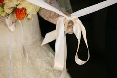 the bride unties the bow before leaving the house stock images the bride unties the bow before leaving the house stock images