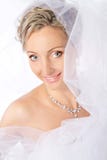 Bride in white veil smiling and looking at camera. stock photography Bride in white veil smiling and looking at camera. stock photography