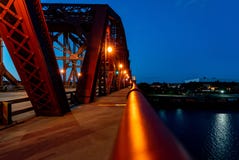 Bridge at night, with skyline in foreground royalty free stock photo Bridge at night, with skyline in foreground royalty free stock photo