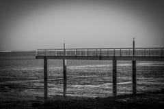 Small bridge on the river in white to black stock photography Small bridge on the river in white to black stock photography