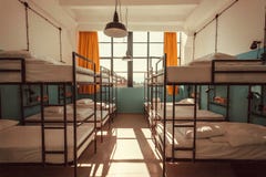 Bright bedroom inside the hostel with clean bunk beds for students and young people Royalty Free Stock Image Bright bedroom inside the hostel with clean bunk beds for students and young people Royalty Free Stock Image