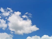 Bright Blue And White Clouds Royalty Free Stock Photography