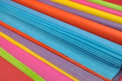 Bright Rainbow Colored Reams (rolls) Of Tissue Wrapping Paper For Gift Wrapping Royalty Free Stock Photo