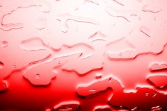 Bright red textured background, spilled bloody color water drops or red liquid illustration, abstract blots pattern close up macro royalty free stock image Bright red textured background, spilled bloody color water drops or red liquid illustration, abstract blots pattern close up macro royalty free stock image