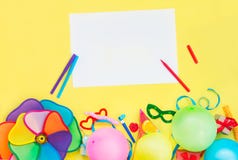 Bright yellow Festive background with empty blank and party tools and decoration - baloons, funny carnival masks, festive tinsel a royalty free stock photos Bright yellow Festive background with empty blank and party tools and decoration - baloons, funny carnival masks, festive tinsel a royalty free stock photos
