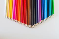 Brightly Colored Pencil Crayons Grouped Together Into a Point Ac royalty free stock photo Brightly Colored Pencil Crayons Grouped Together Into a Point Ac royalty free stock photo