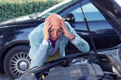 Stressed man having trouble with broken car royalty free stock photos Stressed man having trouble with broken car royalty free stock photos