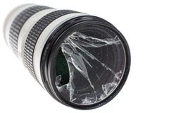 Broken DSLR camera lens filter glass, isolated on white. Background Royalty Free Stock Photos Broken DSLR camera lens filter glass, isolated on white. Background Royalty Free Stock Photos