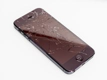 Broken iPhone with cracked screen royalty free stock image Broken iPhone with cracked screen royalty free stock image