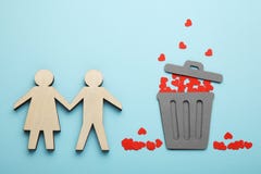 Broken love and dumped red hearts into dumpster. Divorce, parting couple stock photos Broken love and dumped red hearts into dumpster. Divorce, parting couple stock photos