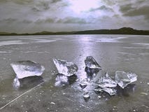 Broken Pieces Of Thick Ice Over Frozen Lake Shine In Sun. Stock Photography