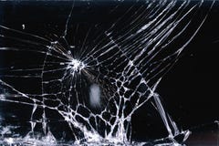 Broken and racked glass screen smartphone , white lines on black background, design element, backdrop texture royalty free stock image Broken and racked glass screen smartphone , white lines on black background, design element, backdrop texture royalty free stock image