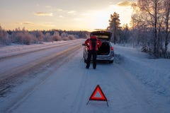 Broken on a snowy winter road Stock Photo Broken on a snowy winter road Stock Photo