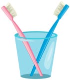 Brosse à dents de couples dans la tasse Photo stock Brosse à dents de couples dans la tasse Photo stock