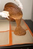 Brown caramel in copper pan ready, dispensing pourring on the pads royalty free stock images Brown caramel in copper pan ready, dispensing pourring on the pads royalty free stock images