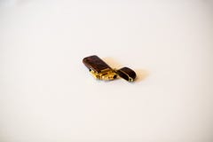 Brown cigarette lighter on white background royalty free stock image Brown cigarette lighter on white background royalty free stock image