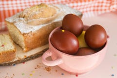 Brown Easter eggs in a plate, Easter cake royalty free stock photography Brown Easter eggs in a plate, Easter cake royalty free stock photography