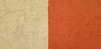 Two-colour brown concrete wall with rough texture royalty free stock images Two-colour brown concrete wall with rough texture royalty free stock images