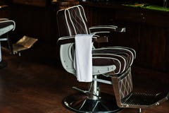 Brown vintage leather chair at stylish barber shop stock image Brown vintage leather chair at stylish barber shop stock image