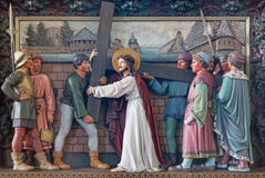 BRUGGE, BELGIUM - JUNE 13, 2014: Jesus carries his cross. Relief in st. Giles (Sint Gilliskerk) stock image BRUGGE, BELGIUM - JUNE 13, 2014: Jesus carries his cross. Relief in st. Giles (Sint Gilliskerk) stock image