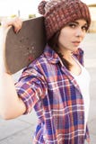 Brunette teenage girl in hipster outfit jeans shorts, keds, pla royalty free stock photos Brunette teenage girl in hipster outfit jeans shorts, keds, pla royalty free stock photos