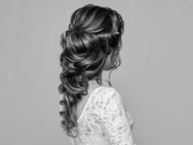 Brunette woman with long and shiny curly hair stock photography Brunette woman with long and shiny curly hair stock photography