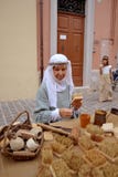 Brush maker on the medieval market