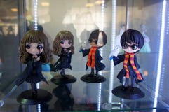 Bubblehead action figures character from Harry Potter Movies displayed in the glass shelf.