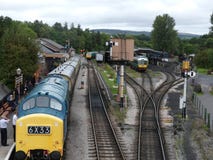 Buckfastleigh, Αγγλία - 27 Αυγούστου 2018 Τραίνα ατμού στο σιδηροδρομικό σταθμό Buckfastleigh που προετοιμάζεται να πυροδοτήσει στοκ φωτογραφίες Buckfastleigh, Αγγλία - 27 Αυγούστου 2018 Τραίνα ατμού στο σιδηροδρομικό σταθμό Buckfastleigh που προετοιμάζεται να πυροδοτήσει στοκ φωτογραφίες