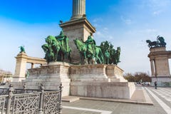 BUDAPEST, HUNGARY - APRIL 04, 2019: Many tourists stroll on the Heroes` Square. Is one of the most-visited attractions stock photos BUDAPEST, HUNGARY - APRIL 04, 2019: Many tourists stroll on the Heroes` Square. Is one of the most-visited attractions stock photos