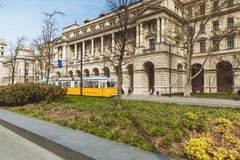 BUDAPEST, HUNGARY - APRIL 03, 2019: Tourists walking near the Parliament Hungary ,Budapest stock images BUDAPEST, HUNGARY - APRIL 03, 2019: Tourists walking near the Parliament Hungary ,Budapest stock images