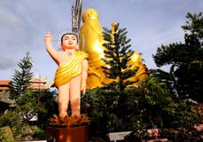 Buddha statue-baby near the Golden Buddha near the Vietnamese city of Dalat stock photo Buddha statue-baby near the Golden Buddha near the Vietnamese city of Dalat stock photo