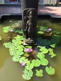 Buddha Statue and Lotus Pond in Borobudur stock photography Buddha Statue and Lotus Pond in Borobudur stock photography