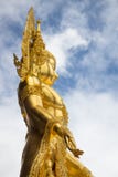 Gold Buddha Statue on blue sky background stock image Gold Buddha Statue on blue sky background stock image