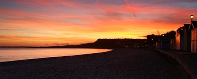 Budliegh Beachuts på solnedgången royaltyfri foto Budliegh Beachuts på solnedgången royaltyfri foto