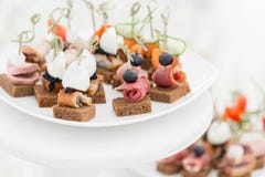 The buffet at the reception. Assortment of canapes. Banquet service. catering food royalty free stock images The buffet at the reception. Assortment of canapes. Banquet service. catering food royalty free stock images