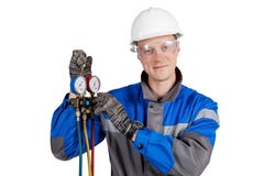 Builder, installer of ventilation with tools in hands stock photography Builder, installer of ventilation with tools in hands stock photography